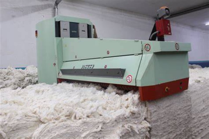 How is cotton cleaned